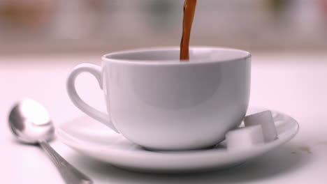 Coffee-pouring-into-coffee-cup