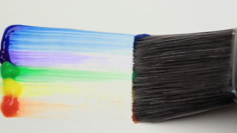 Paintbrush-with-a-rainbow-brush-stroke