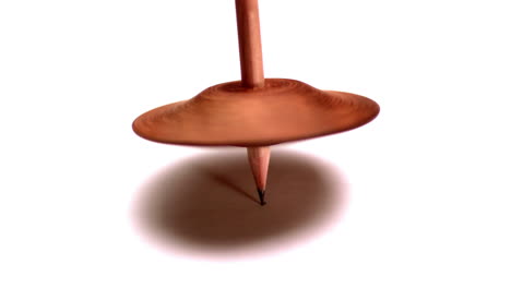 Wood-spinning-top-turning-in-slow-motion-