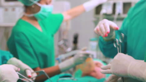 View-of-a-nurse-holding-an-oxygen-mask