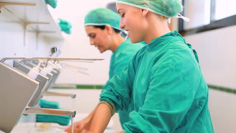 Nurses-putting-hands-and-forearms-under-water