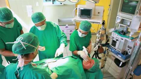 Surgeons-operating-the-stomach-of-a-patient