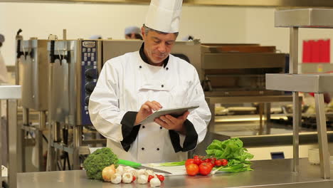 Chef-using-a-tablet-computer-for-taking-notes