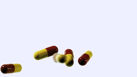 Red-and-yellow-capsule-tablets-falling-and-bouncing