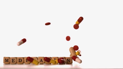 Different-tablets-pouring-over-dice-spelling-medication