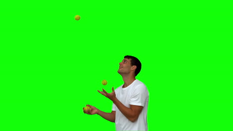 Mann-Dribbelt-Mit-Bällen-Auf-Greenscreen