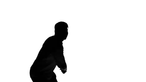 Silhouette-of-a-man-playing-tennis-on-white-background