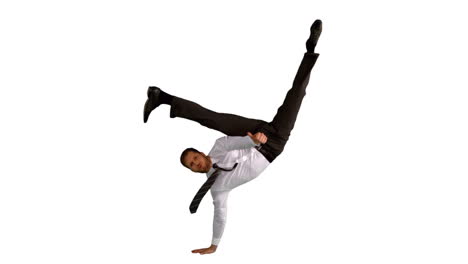 Businessman-doing-handstand-with-legs-outstretched