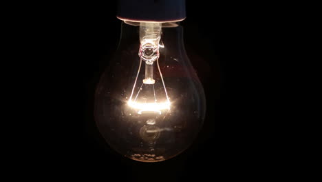 Light-bulb-swinging-and-turning-off