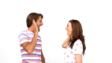 Friends-giving-high-five-on-white-background