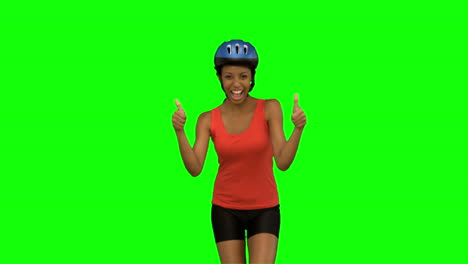 Mujer-Ciclista-Dando-Pulgares-Hacia-Arriba-En-La-Pantalla-Verde