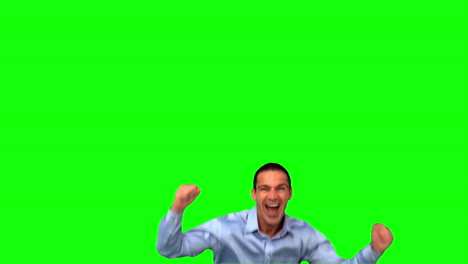 Happy-businessman-jumping-on-green-screen