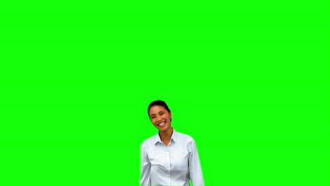 Cheerful-businesswoman-raising-arms-on-green-screen