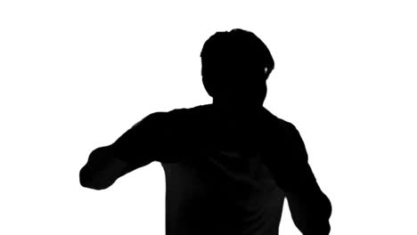 Silhouette-of-a-man-boxing-on-white-background