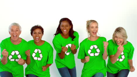 Women-wearing-green-shirt-with-environment-symbol-dancing