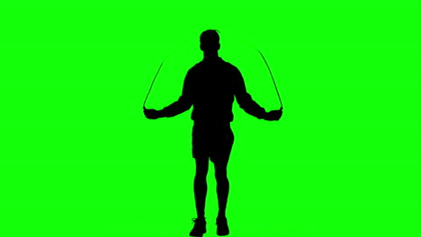 Silhouette-Eines-Mannes,-Der-Mit-Einem-Seil-Auf-Einem-Greenscreen-Trainiert