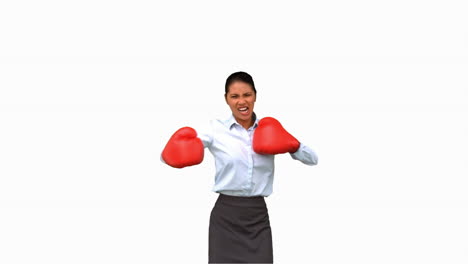 Businesswoman-gesturing-with-boxing-gloves-on-white-screen-
