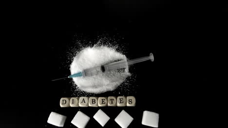 Syringe-of-insulin-falling-into-pile-of-sugar-next-to-sugar-cubes-and-dice-spelling-out-diabetes