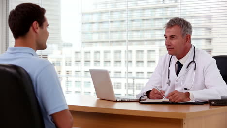 Doctor-asking-questions-to-his-patient-