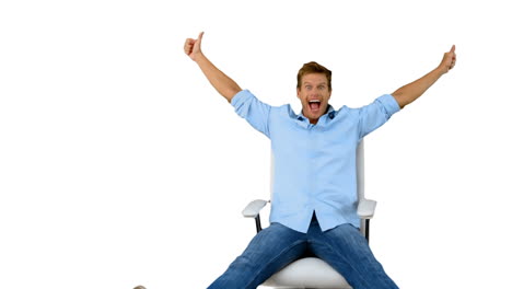 Man-on-swivel-chair-giving-thumbs-up-on-white-screen