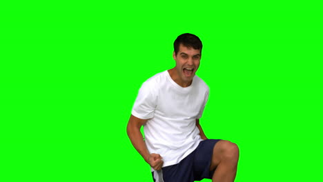 Happy-man-gesturing-on-green-screen