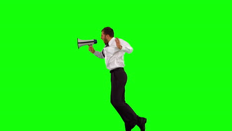 Businessman-holding-megaphone-jumping-up