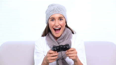 Happy-brunette-playing-video-games-