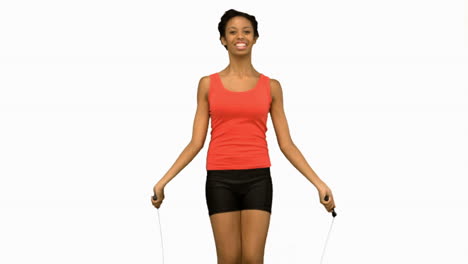 Cheerful-woman-working-out-with-a-rope-on-white-screen