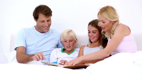 Cute-family-reading-together