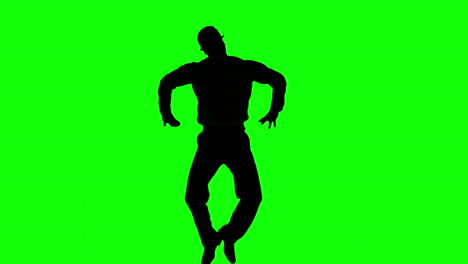 Silhouette-Eines-Mannes,-Der-Mit-Den-Händen-Auf-Den-Hüften-Springt,-Auf-Einem-Grünen-Bildschirm