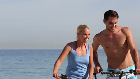 Friends-walking-on-the-beach-