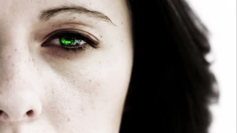 Girl-opening-her-eye-to-reveal-green-scrolling-data