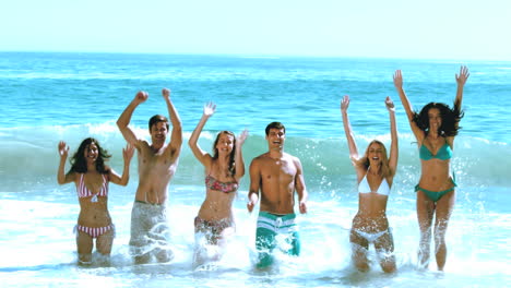Group-of-friends-having-fun-on-the-beach