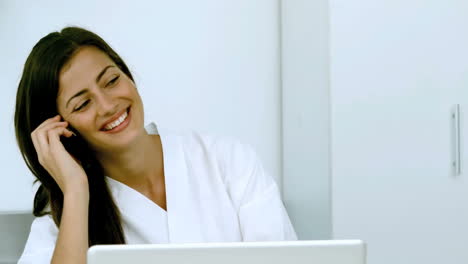 Woman-laughing-during-a-phone-conversation