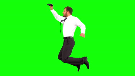 Businessman-looking-through-binoculars-while-jumping