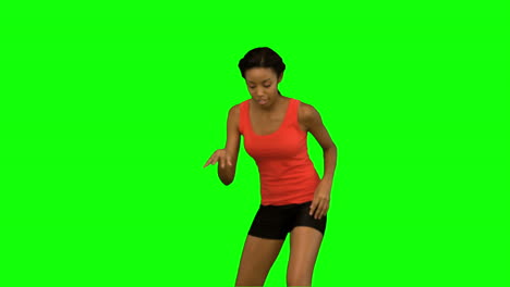 Woman-catching-and-throwing-a-basketball-on-green-screen