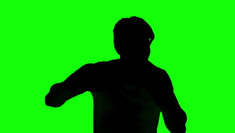 Silhouette-of-a-man-boxing-on-green-screen