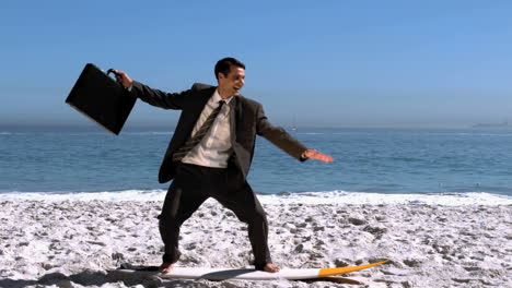 Free-businessman-balancing-on-a-surfboard-