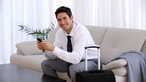 Businessman-using-his-smartphone