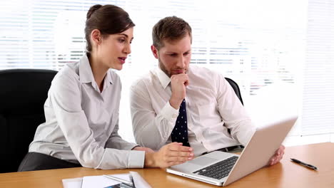 Business-people-working-together-on-the-laptop