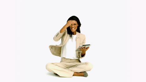 Woman-cheering-with-her-tablet-on-white-background