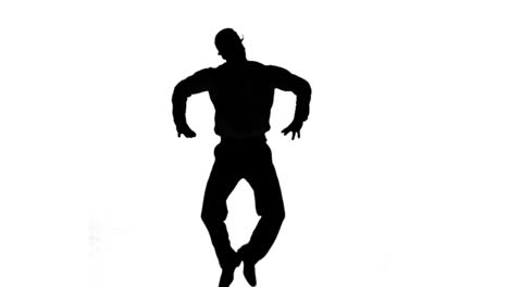 Silhouette-of-a-man-jumping-with-hands-on-hips-on-white-background