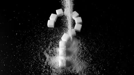 Zuckerpulver-Wird-über-Würfel-Geschüttet,-Die-Ein-Fragezeichen-Bilden