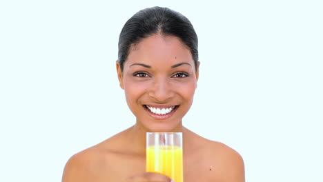 Beautiful-woman-drinking-orange-juice