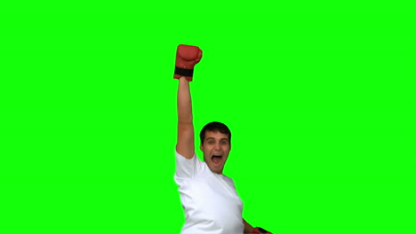 Man-wearing-boxing-gloves-on-green-screen
