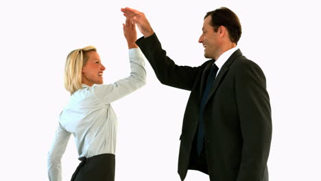 Business-people-high-fiving-each-other