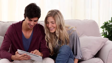 Couple-using-tablet-together