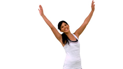 Fit-woman-stretching-her-arms-and-waving