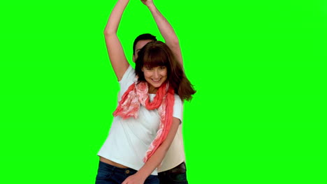 Cute-couple-dancing-on-green-screen