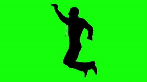 Silhouette-of-a-man-jumping-on-green-screen